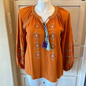 Bohemian style top, orange with purple and teal embroidery and tassels